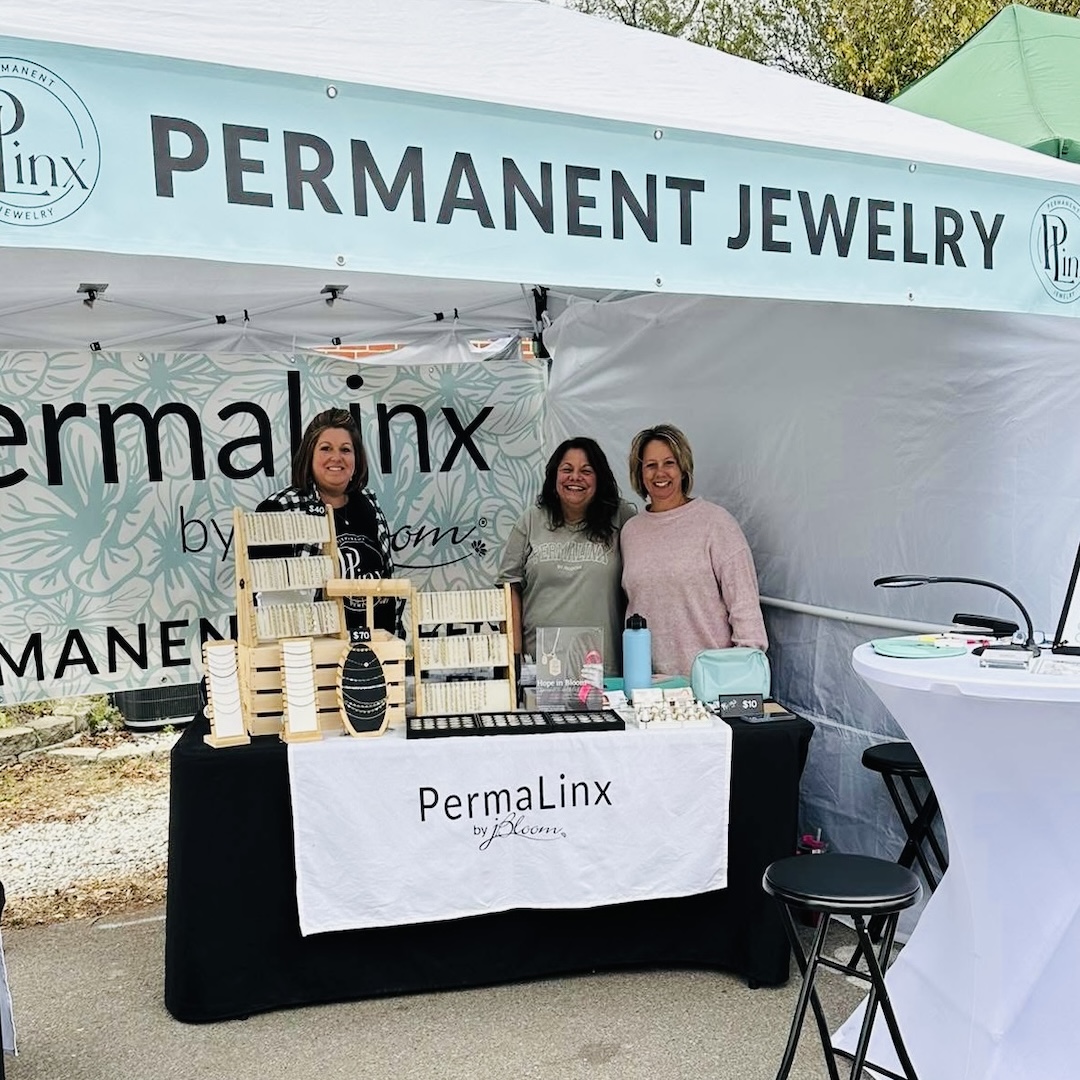 PermaLinx permanent jewelry booth at a Missouri festival event