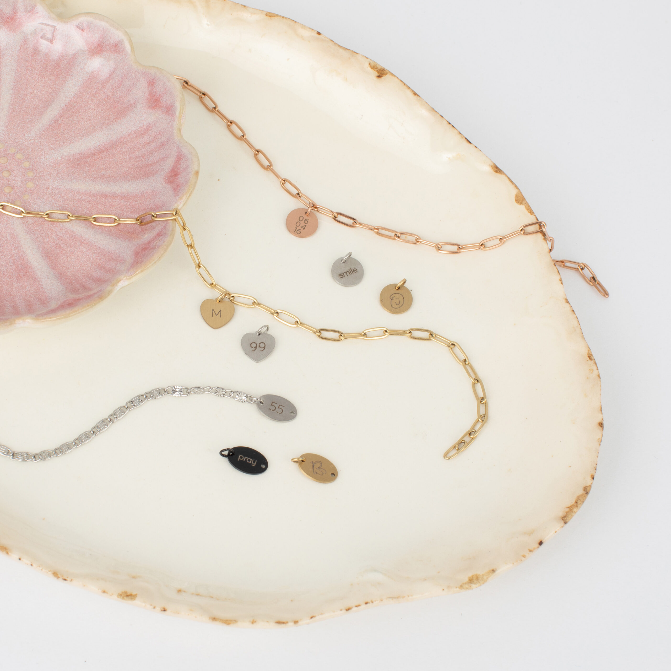 Custom permanent charm necklace with gold chain and meaningful charms