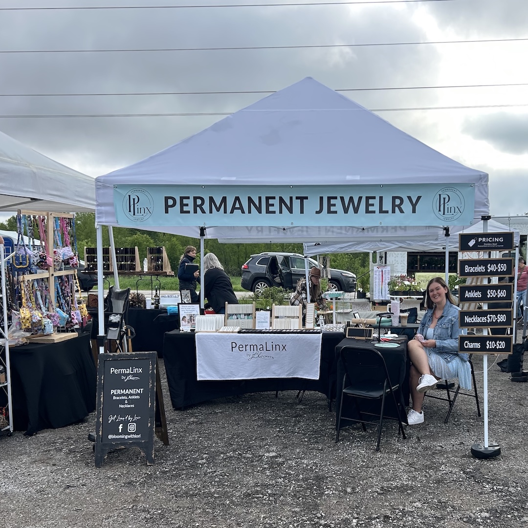 Permanent jewelry booth at a Missouri farmers market